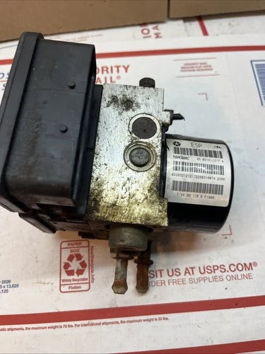 Bomba y módulo ABS 2009 Chrysler Town & Country 3.8L 68043600AC